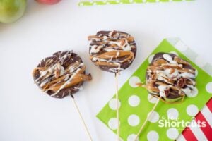Chocolate and Caramel Apple Slices on a Stick